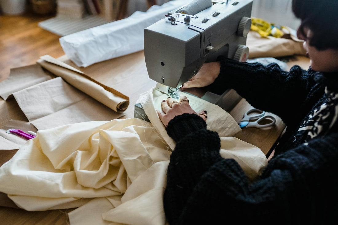 woman using a sewing machine